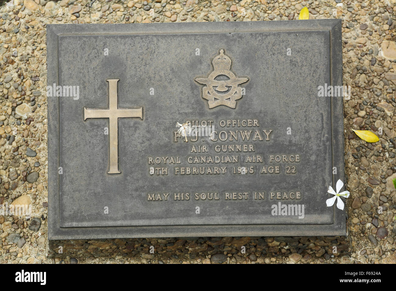 The grave of a Canadian pilot officer at Taukkyan War Cemetery near Yangon, Myanmar. Stock Photo