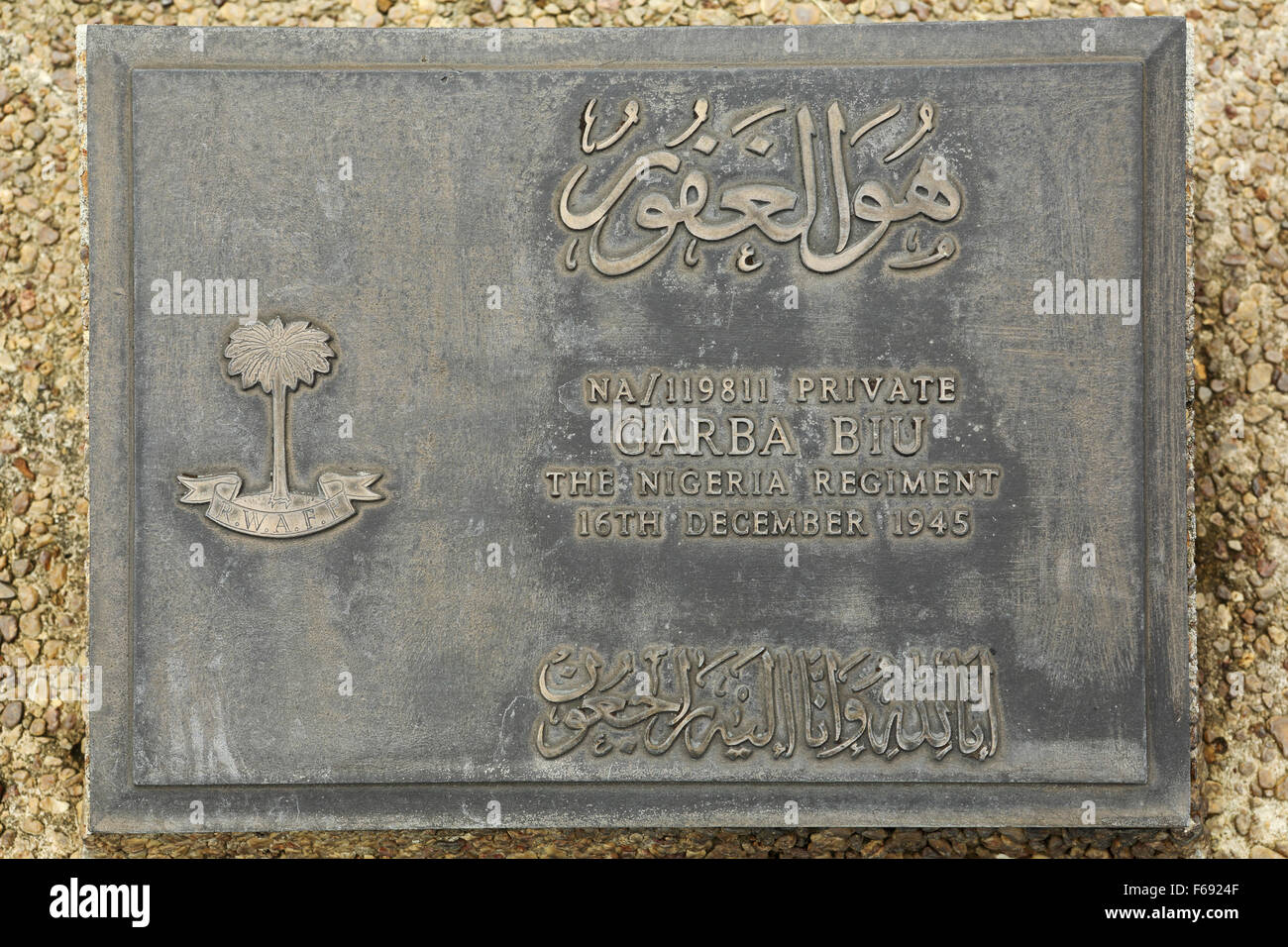The grave of a private from the Nigeria Regiment at Taukkyan War Cemetery near Yangon, Myanmar. Stock Photo