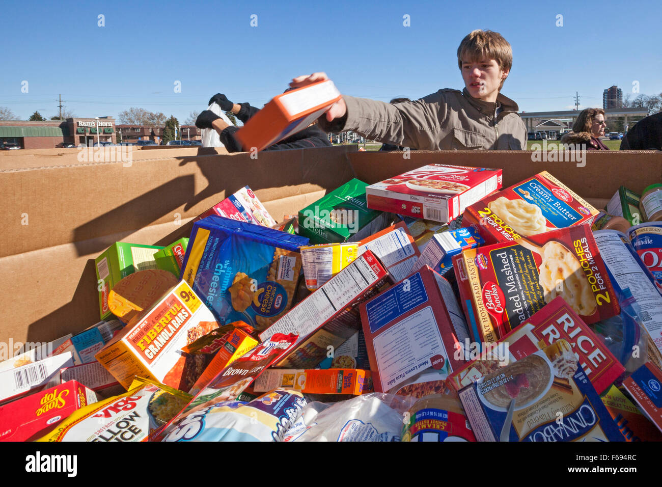 St. Clair Shores, Michigan USA. Volunteers pack food donated for needy