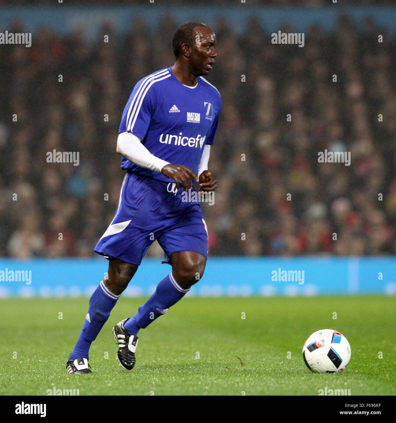 Old Trafford, Manchester, UK. 14th Nov, 2015. Unicef Match for Children. GB and NI XI versus Rest of the World XI. Dwight Yorke (Rest of World) in action © Action Plus Sports/Alamy Live News Stock Photo