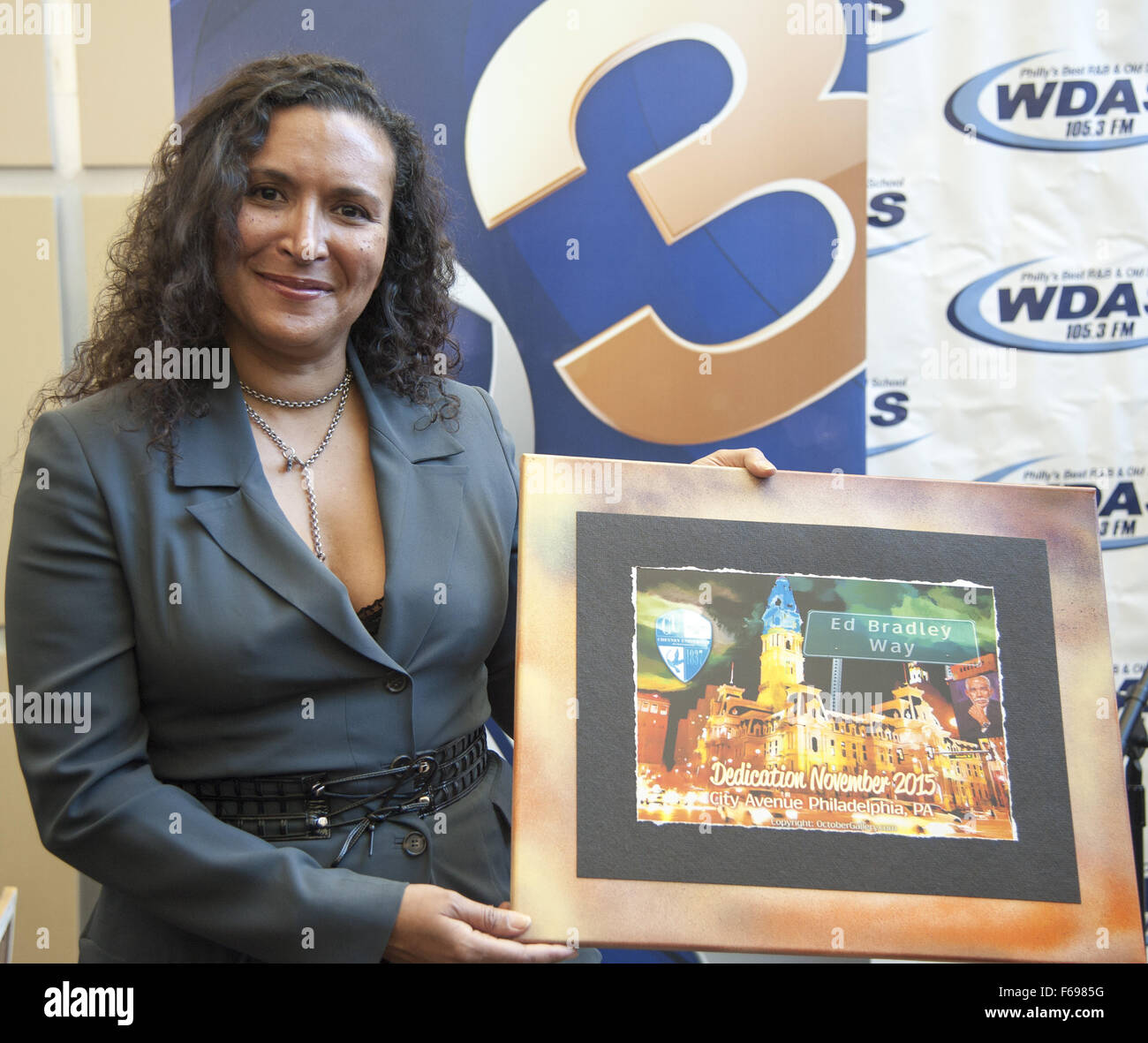 Philadelphia, Pennsylvania, USA. 14th Nov, 2015. PATRICIA BLANCHET, widow  of the late Ed Bradley holds a special painting from the October Art  Gallery in celebration of her late husband The dedication ceremonies