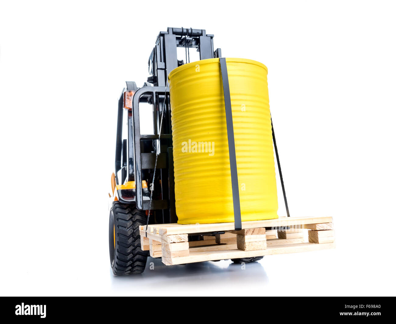 forklift truck with yellow container placed on wooden pallet shot on white background Stock Photo