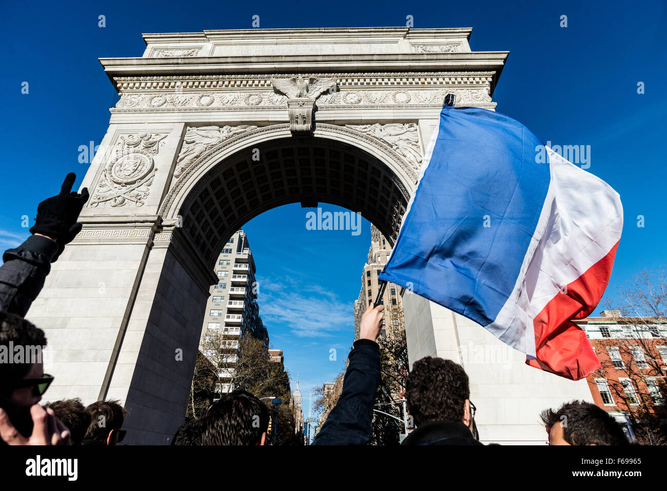 New York, NY - 14 November 2015 NYC  New Yorkers and French Nationals gathered beneath the Washington Square arch in a vigil to commemorate the victims of the 13 November Paris terror attacks. Credit: Stacy Walsh Rosenstock/Alamy Live News Stock Photo