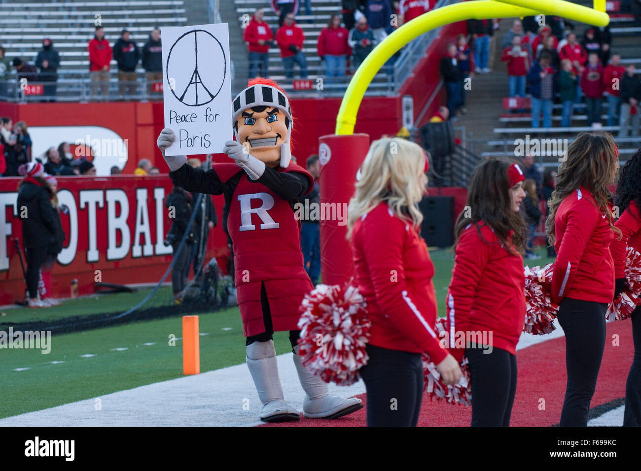 Piscataway, NJ, USA. 14th Nov, 2015. The Rutgers Scarlet Knights mascot Colonel Rutgers holds a peace sign for Paris during the game between The Nebraska Cornhuskers and Rutgers Scarlet Knights at Highpoint Solutions Stadium in Piscataway, NJ. Mandatory Credit: Kostas Lymperopoulos/CSM, Credit:  csm/Alamy Live News Stock Photo