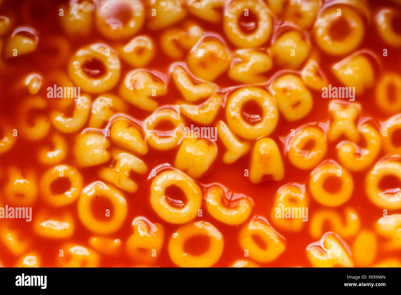 Closeup Of Alphabet Spaghetti In Tomato Sauce Stock Photo