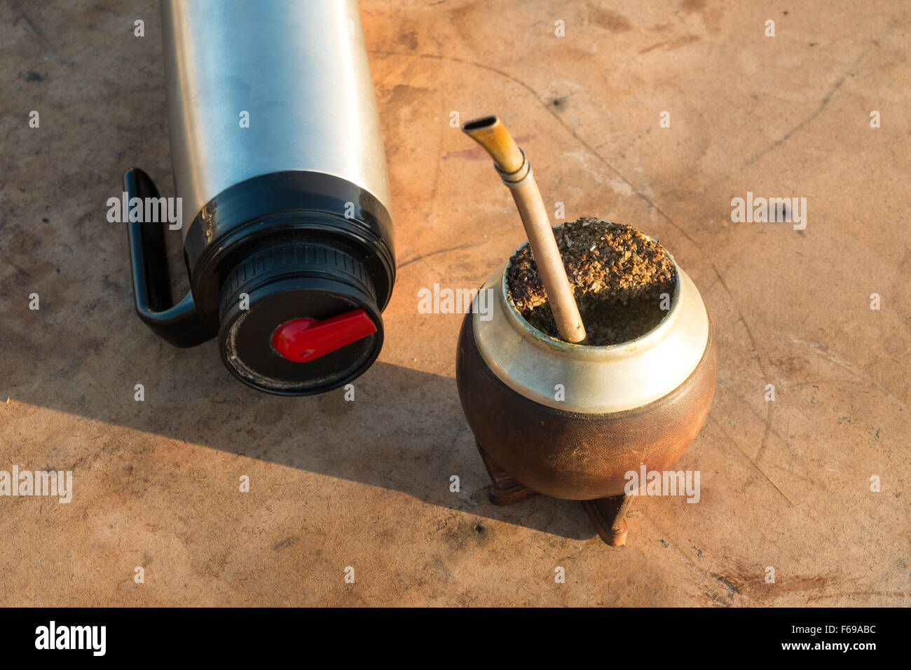 Traditional mate drinking equipment on a rustic table Stock Photo