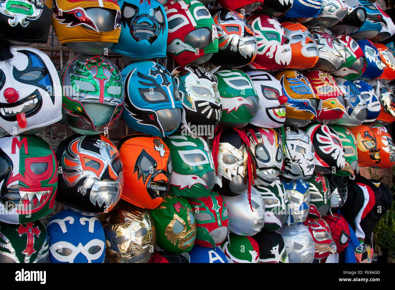 Lucha Libre masks in front of a shop on 24th Street in The Mission in San Francisco, California. Stock Photo