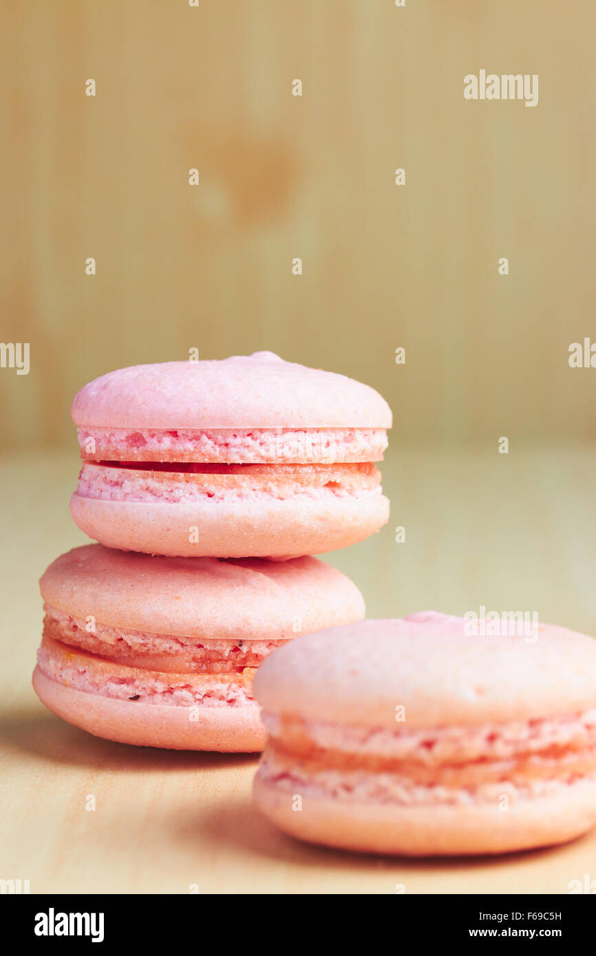 Sweet french macaroons on wooden background Stock Photo