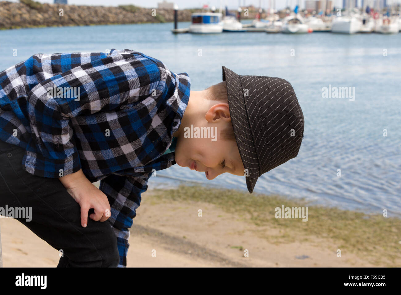 Child bending over boy hires stock photography and images Alamy