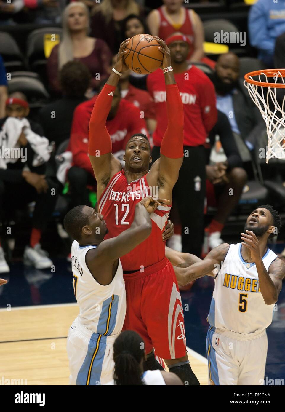 Denver, Colorado, USA. 13th Nov, 2015. Rockets DWIGHT HOWARD, top grabs ...