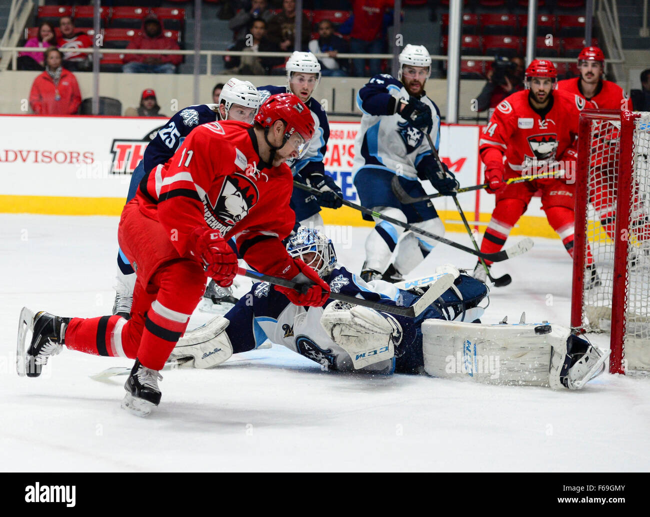 Charlotte Checkers Forward Zach Boychuk (11) and Milwaukee Admirals Goalie Juuse Saros (74) during the AHL game between the Milwaukee Admirals and the Charlotte Checkers on Saturday Nov. 14, 2015 at Bojangles Coliseum, in Charlotte, NC. Jacob Kupferman/CSM Stock Photo