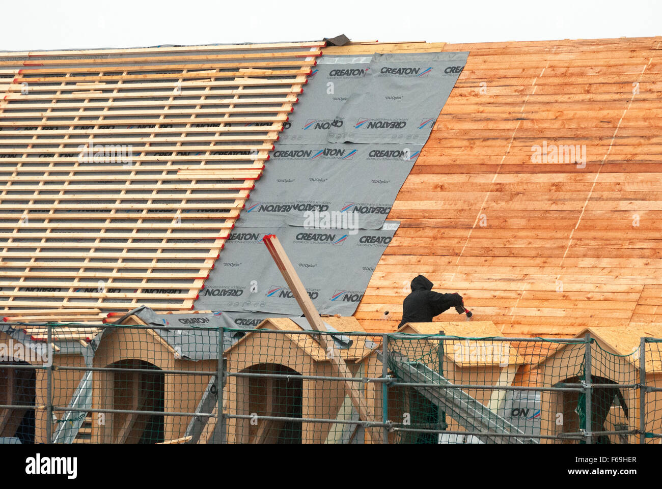 Builder recreating historic pitched roofing style in Dresden, Germany Stock Photo