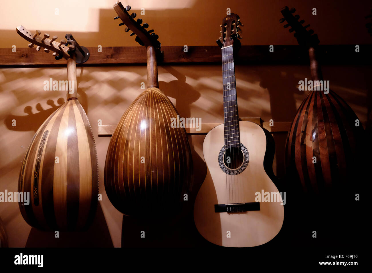 Collection of Oud instruments hanging in Shahin Music bar in the mixed
