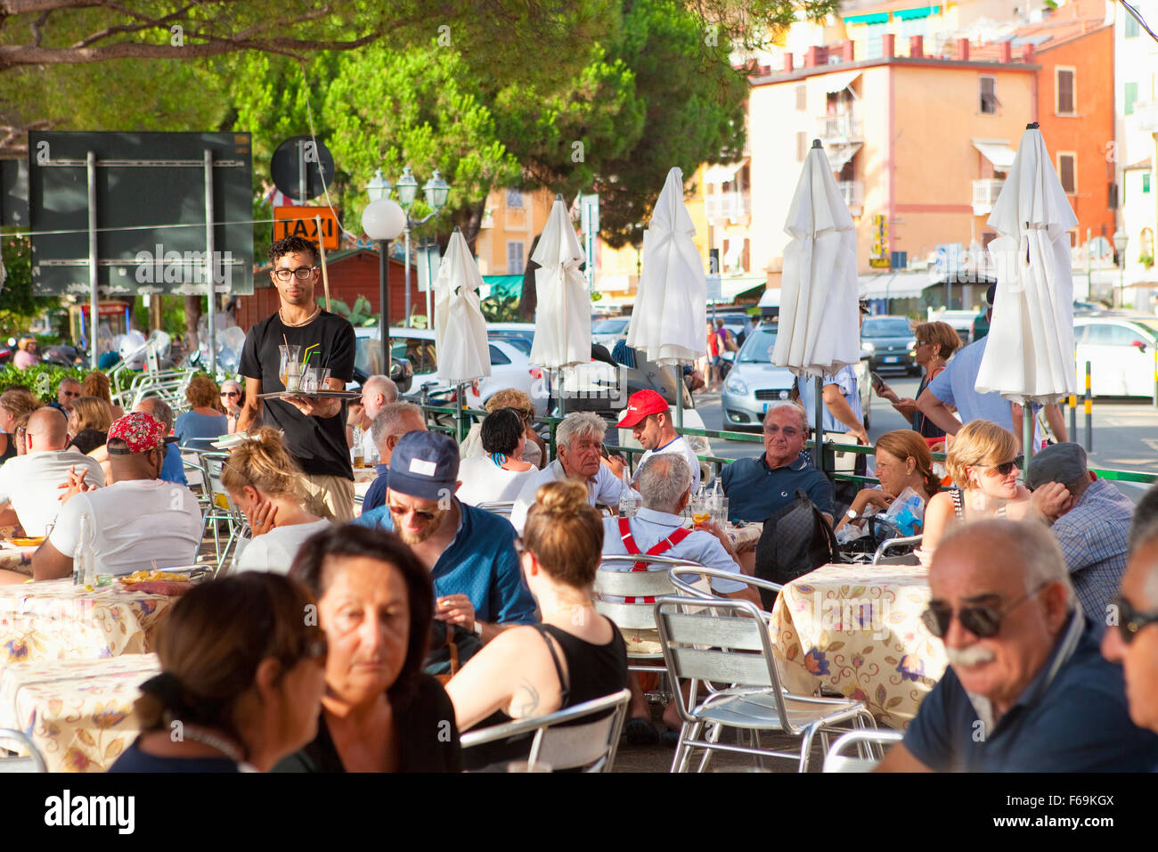 Italy Liguria Lerici -  People in Outdoor Restaurant Stock Photo