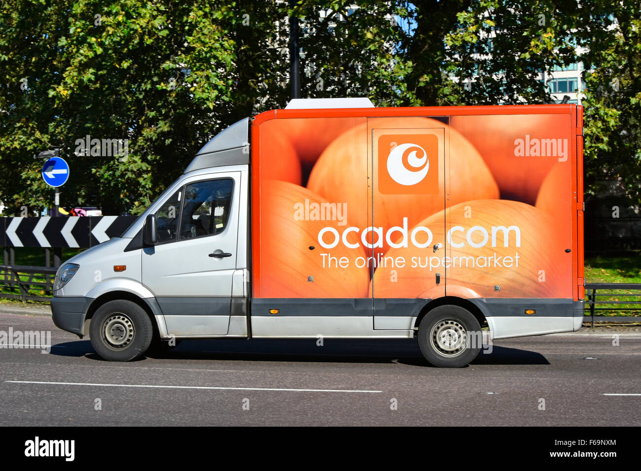 Ocado delivery van side view of online food grocery shopping