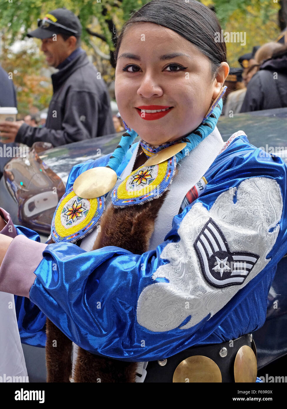 A member of Native American Women Warriors smiling prior to the start of the Veteran's Day Parade in New York City Stock Photo