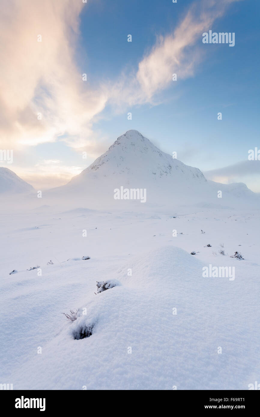 Buachaille Etive Beag with the vast moorland lying at its foot covered in a thick layer of snow, Glen Coe, Scotland Stock Photo