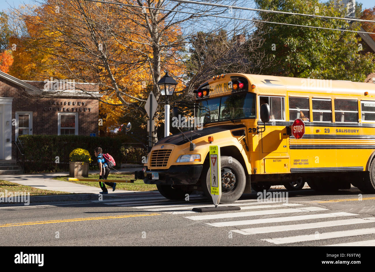 A USA school bus stopped to let children off, Salisbury, Connecticut USA Stock Photo