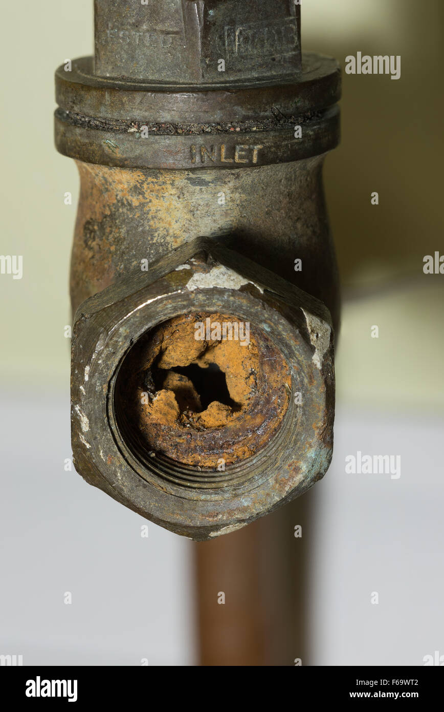 Cause of blocked mains stop cock hard water calcium carbonate deposits
