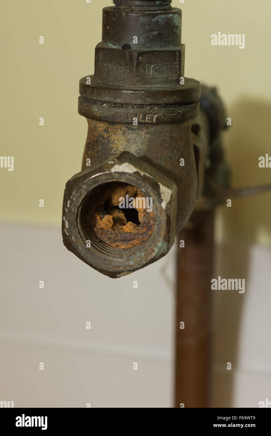 Cause of blocked mains stop cock hard water calcium carbonate deposits