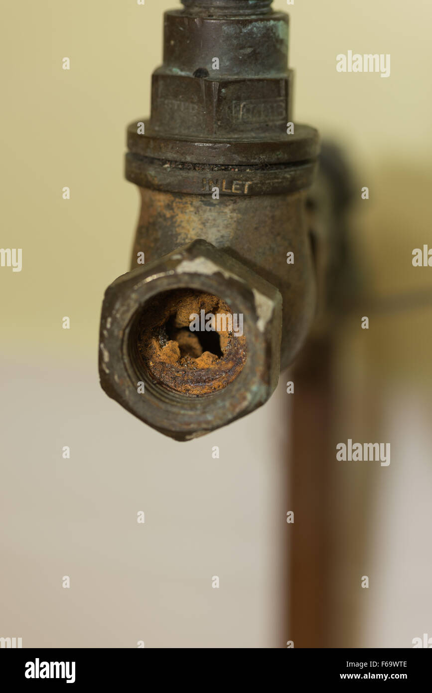 Cause of blocked mains stop cock hard water calcium carbonate deposits