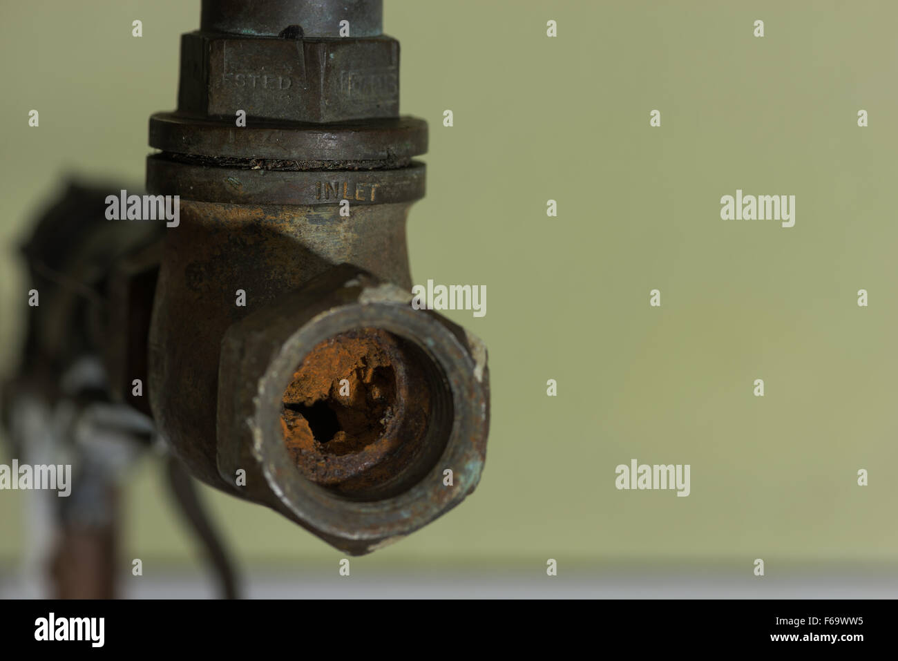 Cause of blocked mains stop cock hard water calcium carbonate deposits