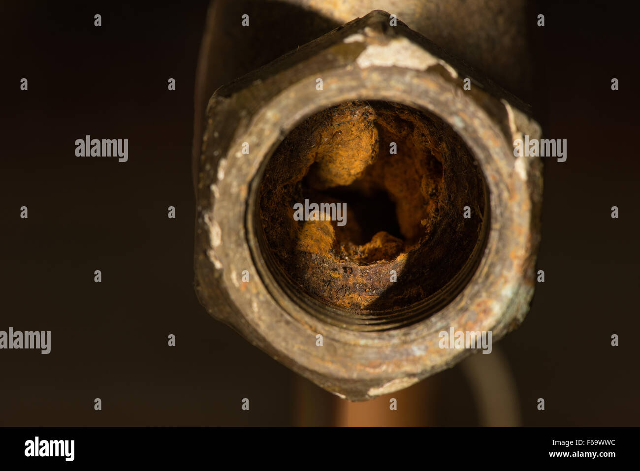 Cause of blocked mains stop cock hard water calcium carbonate deposits