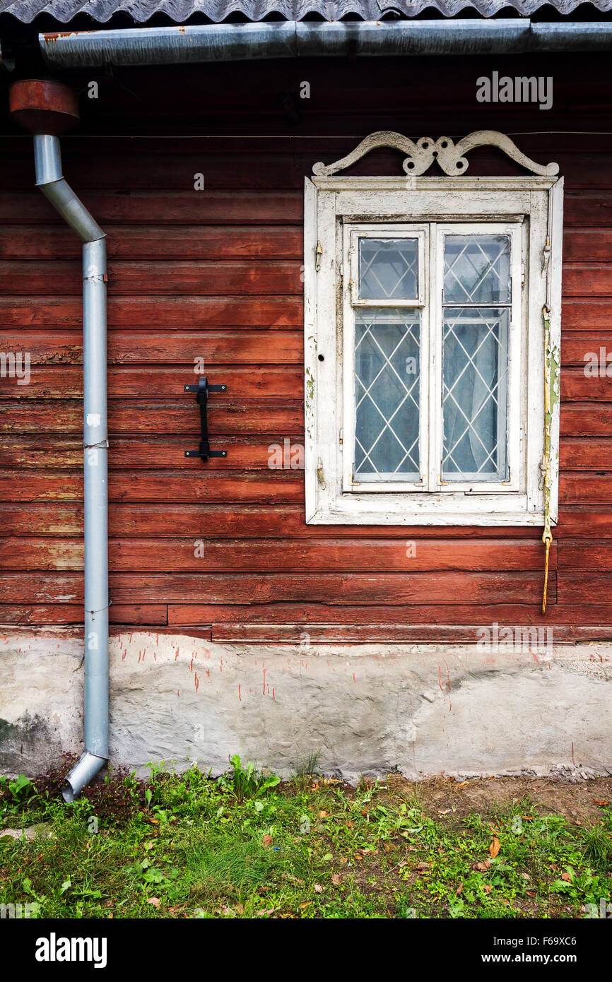 Old window on a aged wooden wall Stock Photo - Alamy