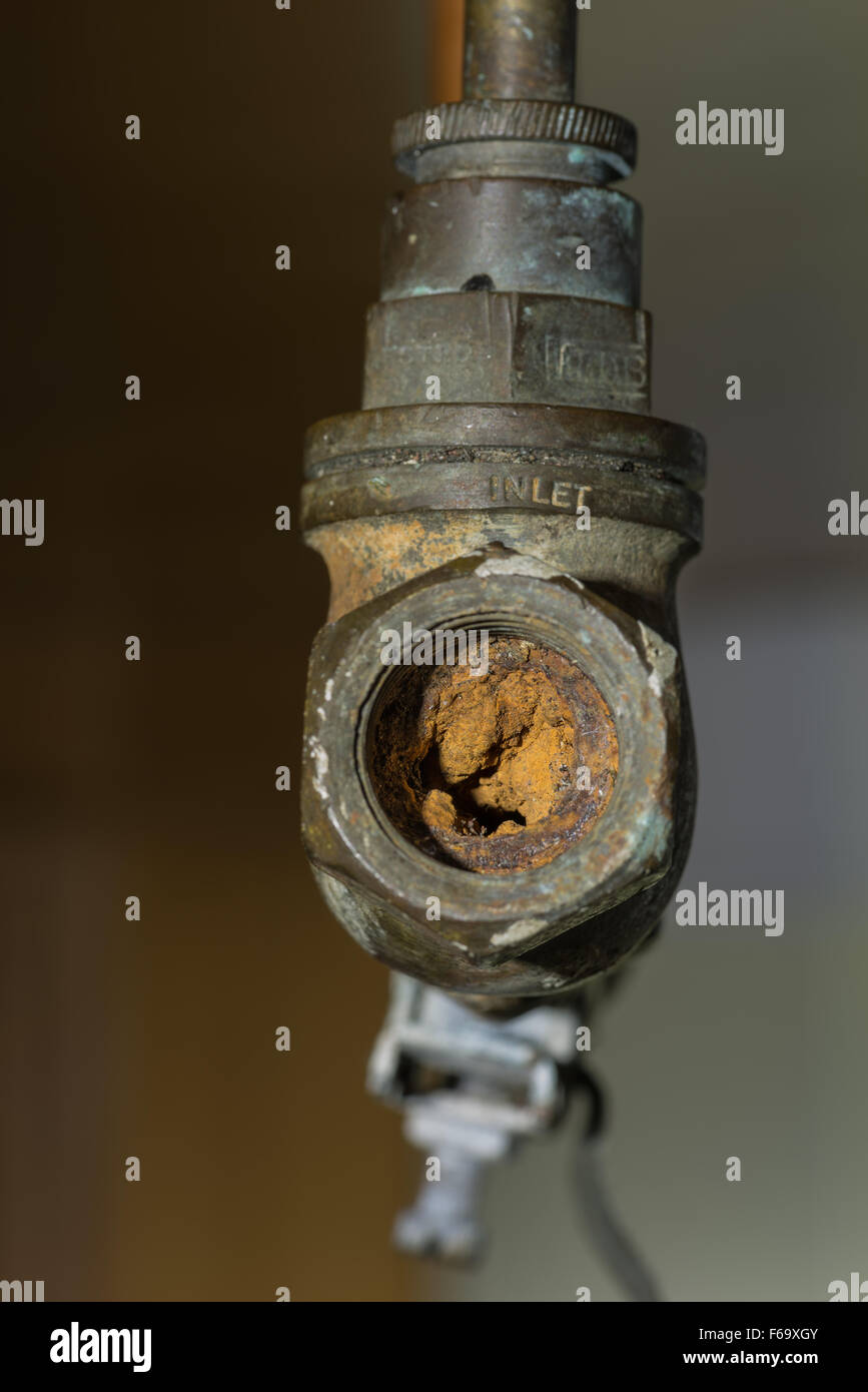 Cause of blocked mains stop cock hard water calcium carbonate deposits