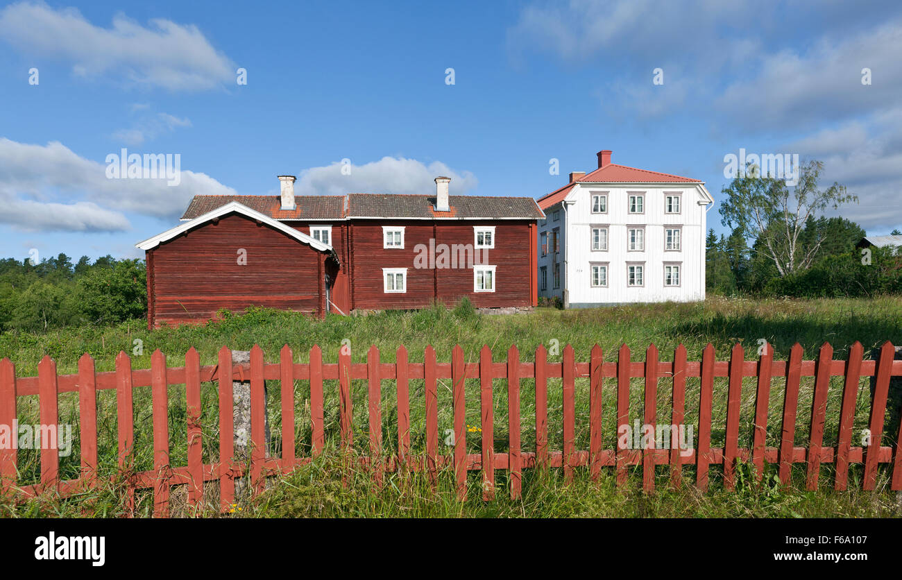 HALSINGLAND, SWEDEN ON JULY 24, 2015. View of a beautiful wooden homestead. UNESCO World Heritage Site. Fence. Editorial use. Stock Photo