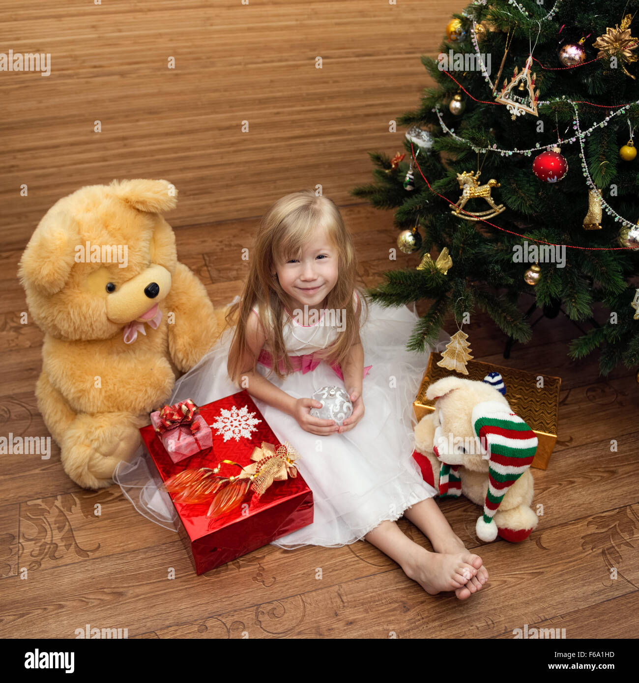 Christmas portrait of a beautiful little girl Stock Photo - Alamy
