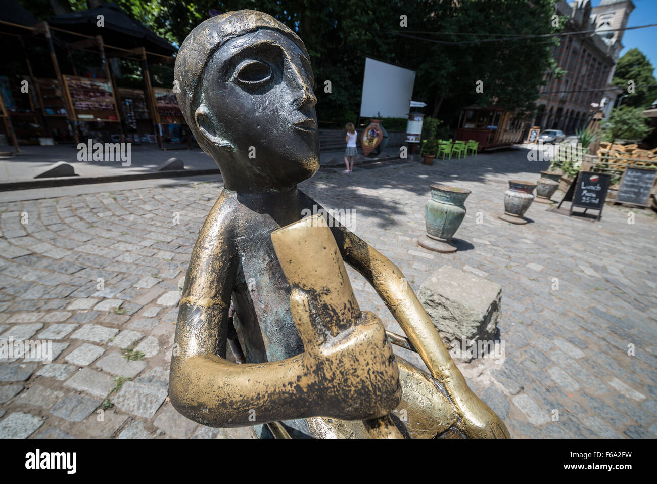 small Tamada statue at popular Shardeni Street with lot of clubs, pubs ...