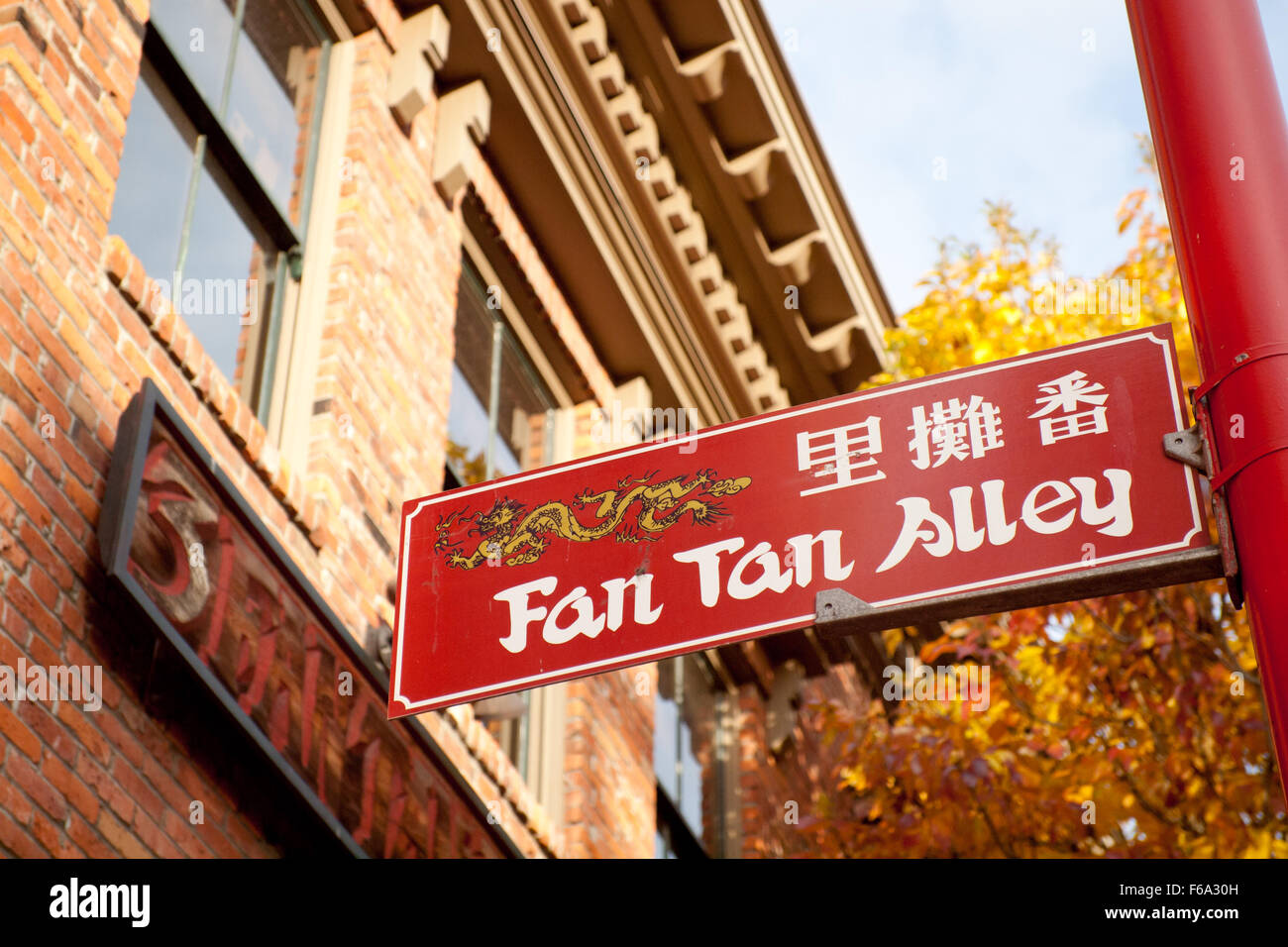 A street sign for Fan Tan Alley in Chinatown, Victoria, British Columbia, Canada. Stock Photo