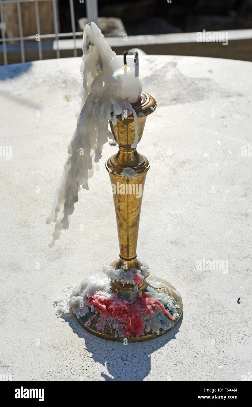 A melted candle shows the strength and direction of the wind in Otter Cove, Maine. Stock Photo