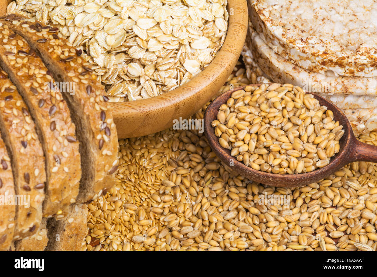 Variety of grains rolled oats, golden linseeds (flax seeds), whole
