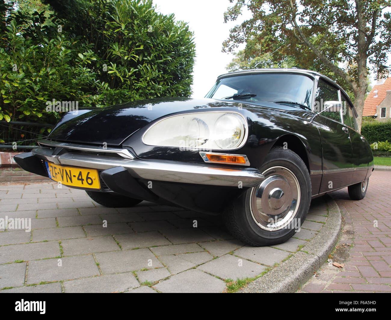 A black Citroen DS23, captured in the fourth image, showcasing the ...