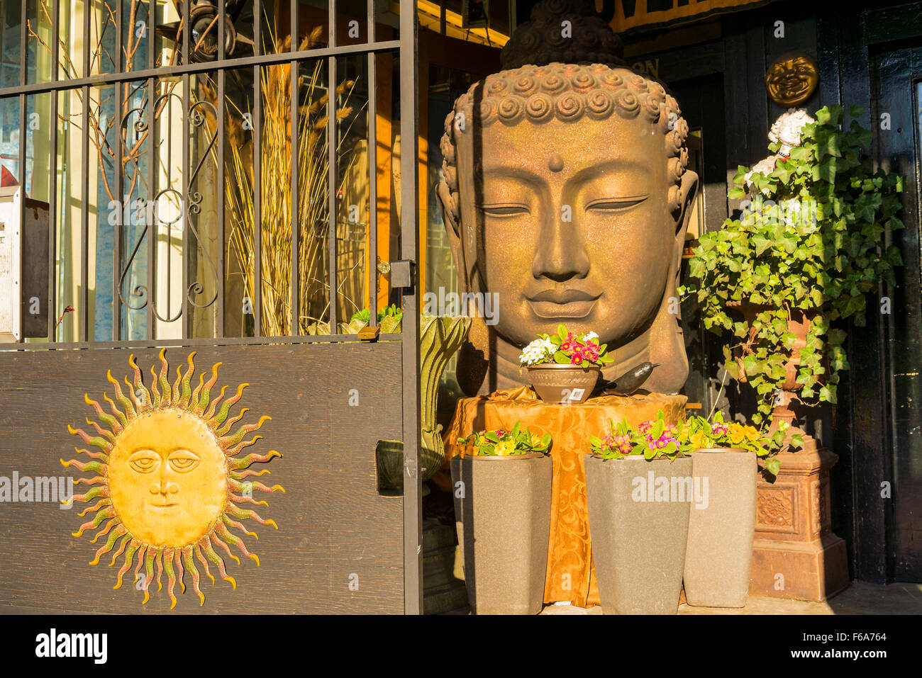 Buddha figure at Antique store entrance, Vancouver, British Columbia, Canada Stock Photo