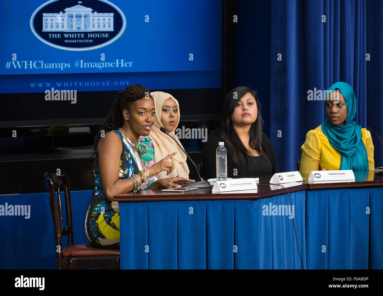 Franchesca Ramsey moderates a panel discussion with (from left to right) Asha Abdi, Yesenia Ayala, and Faatimah Knight at the Young Women Empowering Communities: Champions of Change event on Tuesday, September 15, 2015 at the Eisenhower Executive Office Building in Washington, DC. The Champions of Change program was created by the White House to recognize 'individuals doing extraordinary things to empower and inspire members of their communities.' Photo Credit: (NASA/Aubrey Gemignani). Stock Photo