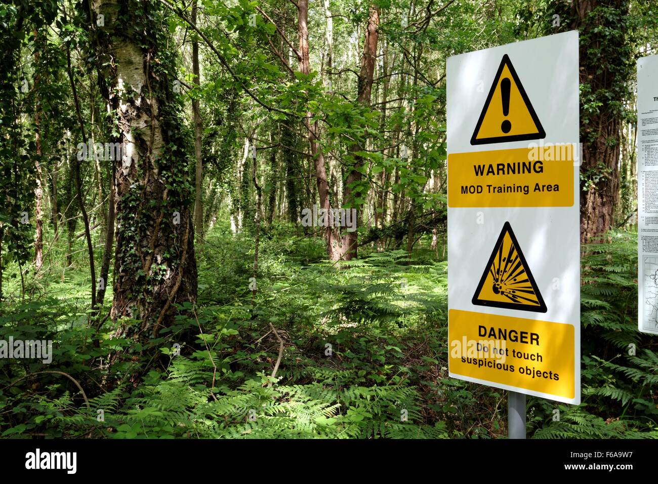 MOD warning signs on army training area in Aldershot Hampshire UK Stock Photo