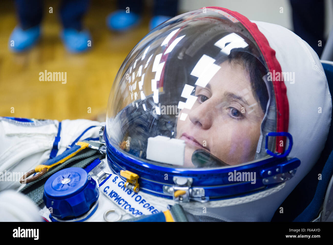 Expedition 42 Flight Engineer Samantha Cristoforetti of the European Space Agency (ESA) has her Russian Sokol suit pressure checked in preparation for her launch aboard the Soyuz TMA-15M spacecraft on Sunday, Nov. 23, 2014, at the Baikonur Cosmodrome in Baikonur, Kazakhstan. Launch of the Soyuz rocket is scheduled for the early hours of Nov. 24 and will carry Cristoforetti and fellow crewmates, Soyuz Commander Anton Shkaplerov of the Russian Federal Space Agency (Roscosmos), and Flight Engineer Terry Virts of NASA, into orbit to begin their five and a half month mission on the International Sp Stock Photo