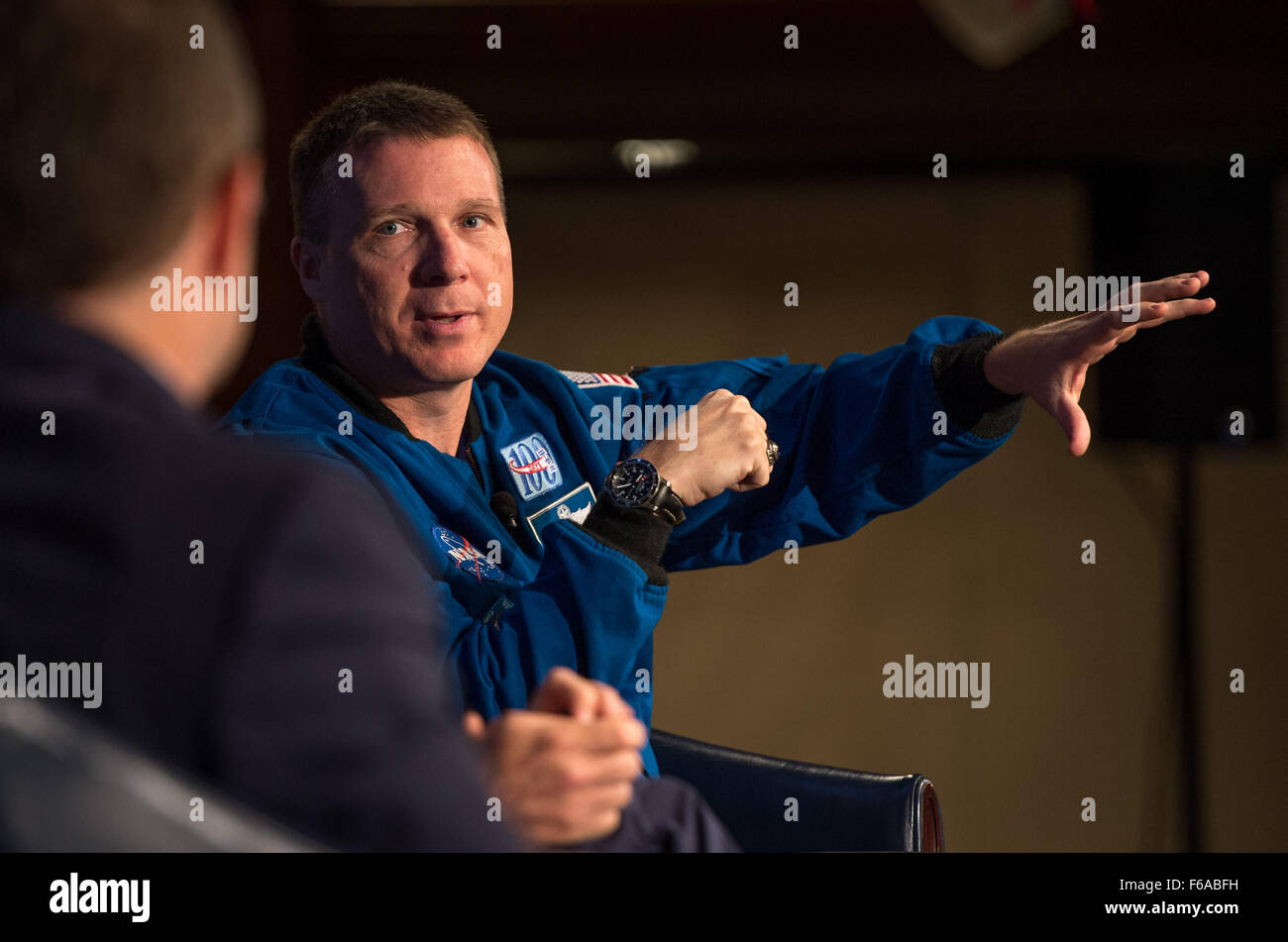 Astronaut Terry Virts discusses space exploration with retired astronauts Mark and Scott Kelly, reflecting on their experiences aboard the International Space Station and the progress of human spaceflight. Stock Photo