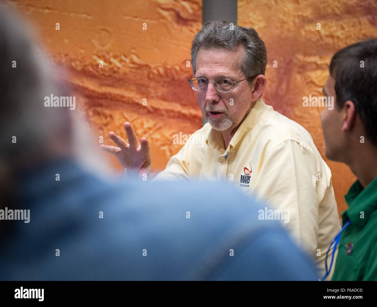 Jim Green, director of the Planetary Science Division at NASA Headquarters, answers reporter's questions following the First Landing Site/Exploration Zone Workshop for Human Missions to the Surface of Mars held at the Lunar and Planetary Institute, Friday, Oct. 30, 2015, in Houston, Texas. The agency is hosting the workshop to collect proposals for locations on Mars that would be of high scientific research value while also providing natural resources to enable human explorers to land, live and work safely on the Red Planet. Photo Credit: (NASA/Bill Ingalls) Stock Photo