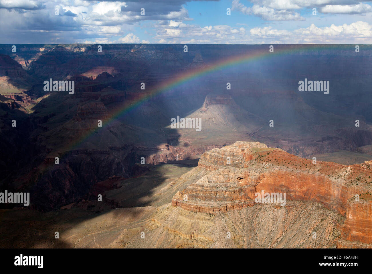 A rainbow arcs across the Grand Canyon during a summer storm Stock ...