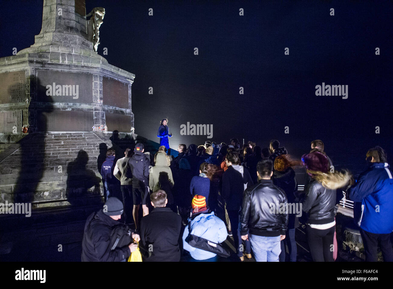 Aberystwyth Wales UK, Sunday 15 November 2015  A group of Aberystwyth university students hold an emotional candle-lit vigil on the steps of the town’s iconic war memorial,  in memory of all those killed in the Paris terrorist attacks of September 13 2015    photo Credit:  Keith Morris / Alamy Live News Stock Photo