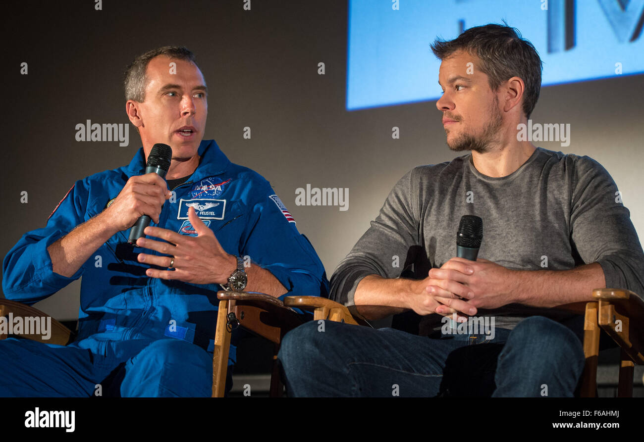 NASA Astronaut Drew Feustel, left, and Actor Matt Damon participate in a question and answer session about NASA’s journey to Mars and the film ”The Martian,” Tuesday, Aug. 18, 2015, at the United Artist Theater in La Cañada Flintridge, California. NASA scientists and engineers served as technical consultants on the film. The movie portrays a realistic view of the climate and topography of Mars, based on NASA data, and some of the challenges NASA faces as we prepare for human exploration of the Red Planet in the 2030s. Photo Credit: (NASA/Bill Ingalls) Stock Photo