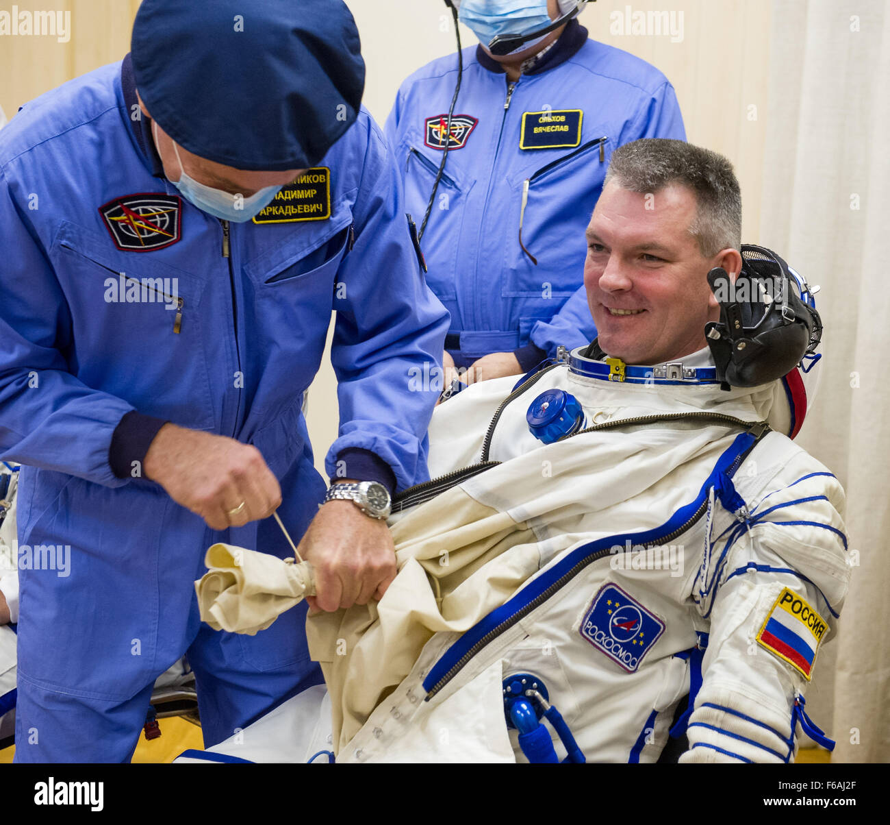 Russian cosmonauts Alexander Samokutyaev and Andrey Shelepin suit up for Expedition 41 in their Sokol space suits at the Baikonur Cosmodrome. They are preparing for their Soyuz TMA-14M launch to the International Space Station. Stock Photo