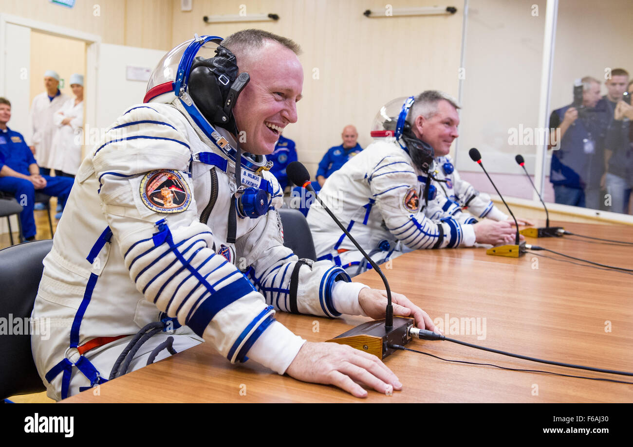 Cosmonauts Alexander Samokutyaev and Andrey Shelepin, along with NASA astronaut Barry Wilmore, suit up for launch at Baikonur Cosmodrome as part of Expedition 41. Stock Photo