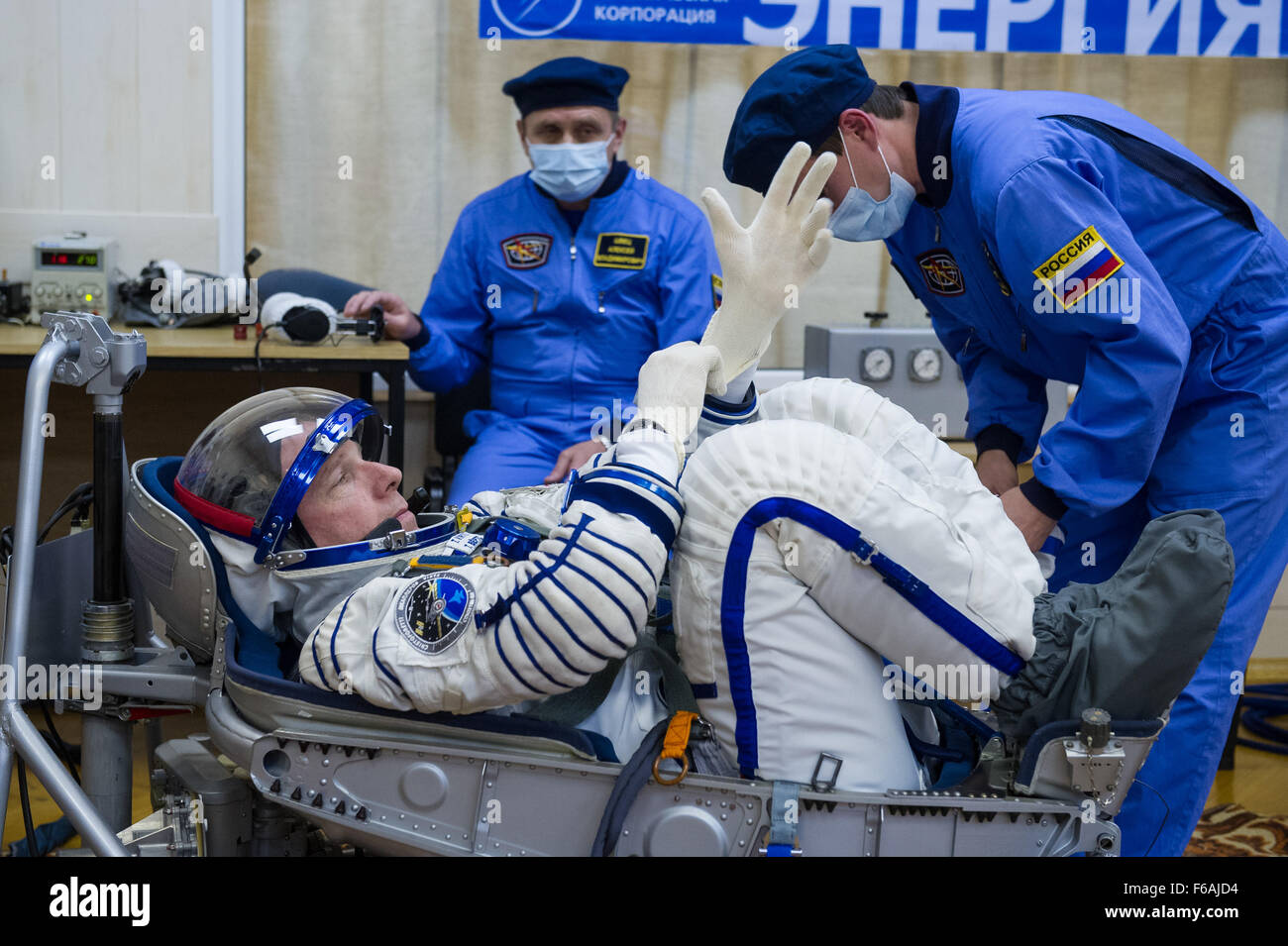 Astronaut Andrey Shelepin conducts a pressure check on the Soyuz TMA-15M spacecraft at Baikonur Cosmodrome, Kazakhstan, as part of the prelaunch preparations for Expedition 42. Stock Photo