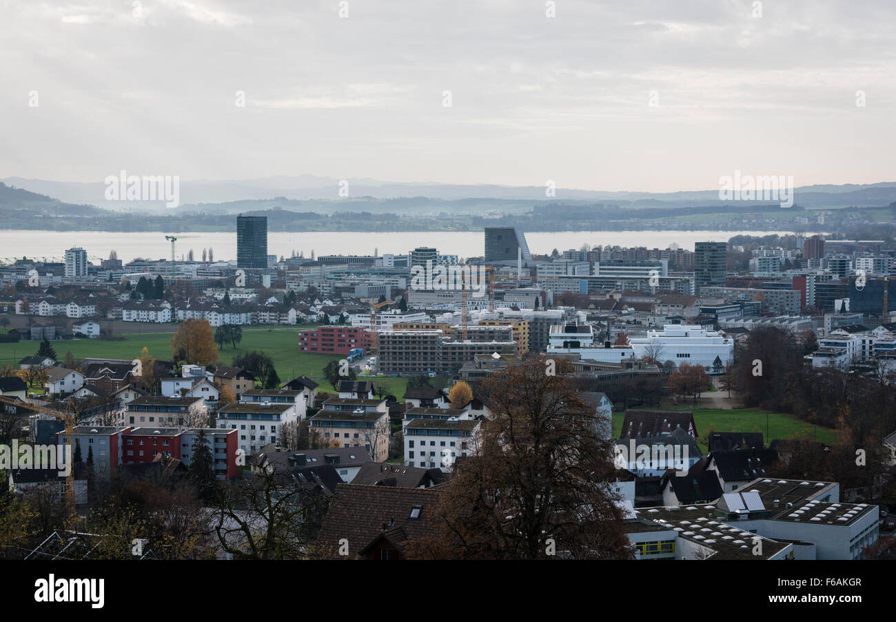 The Swiss city of Zug with Lake Zug in the background and Baar in the foreground. Stock Photo