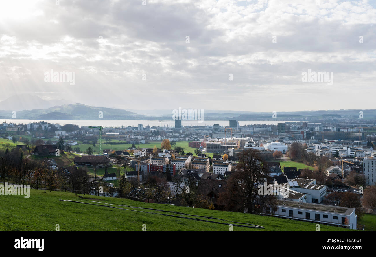 The Swiss city of Zug with Lake Zug in the background and Baar in the foreground. Stock Photo